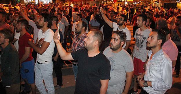 Crowd marches in central Turkey after claiming power blackout was coup attempt