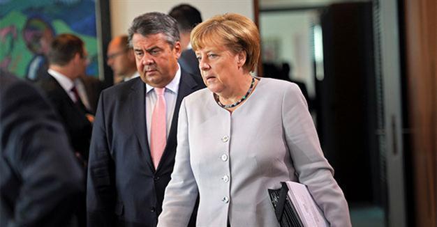 Merkel says faults made in refugee crisis