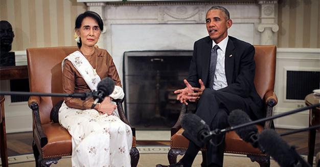 Obama vows to lift Myanmar sanctions as Suu Kyi visits