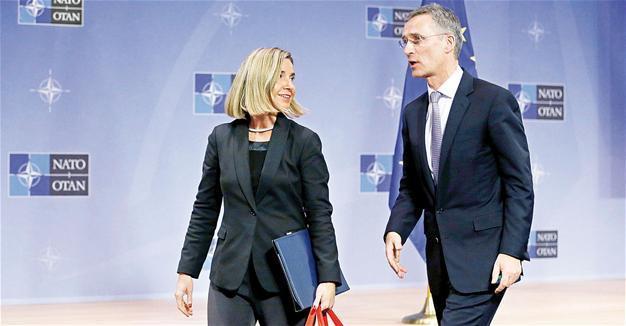 NATO chief urges West to keep pressuring Russia over Ukraine