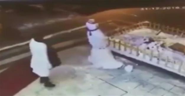 Footage showing Ankara woman slipping and falling while kicking snowman goes viral