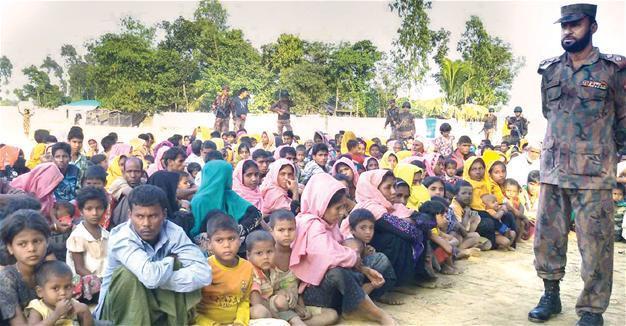 Myanmar detains police over Rohingya abuse video