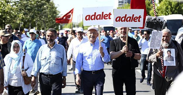 Justice minister accuses CHP head of committing crime in protest march