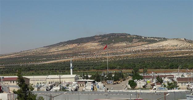 Turkish artillery shells PYD positions in northern Syria after harassment fire