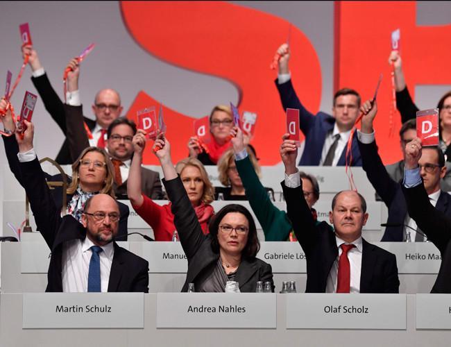 Germanys SPD agrees to open govt talks with Merkel