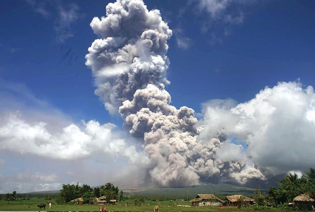 Philippine volcano explodes, authorities raise alert level