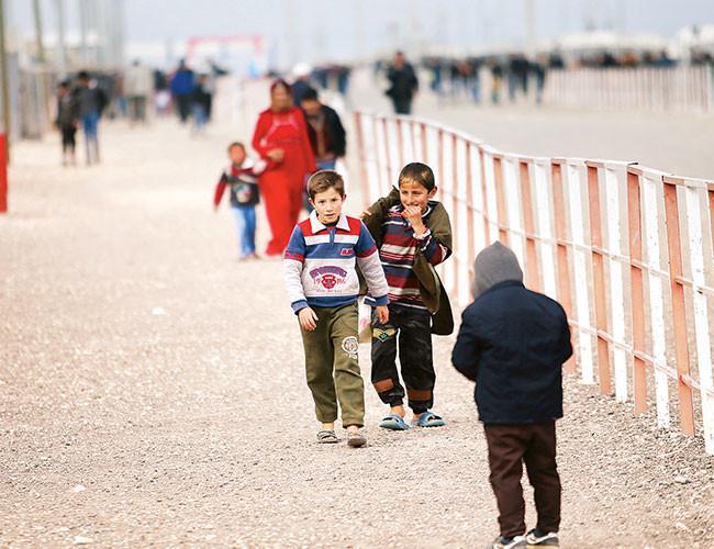 Turkey calls on EU to honor its part of key 2016 migrant deal