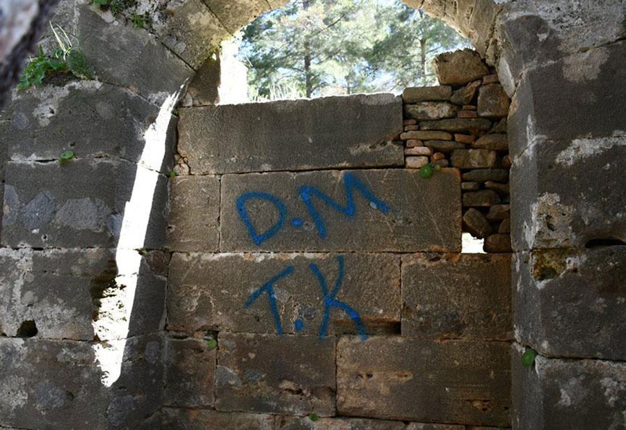 Vandals spray paint historic Side artifacts