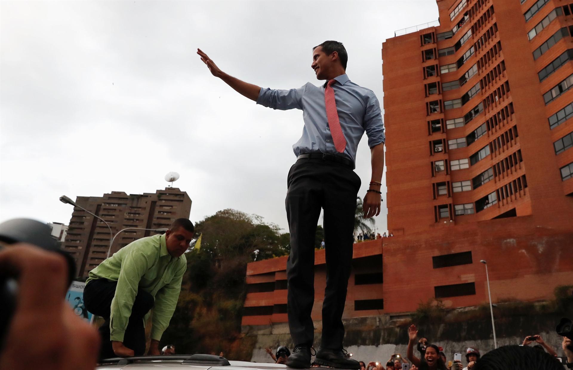 Venezuelan government targets Guaido as some power returns