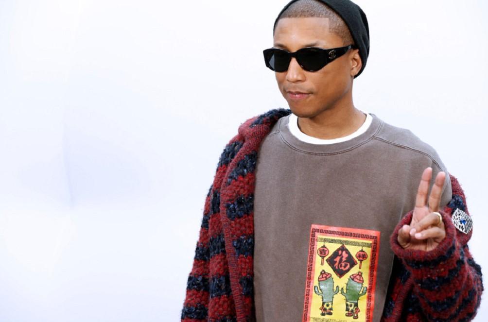 Pharrell Williams in Chanel and Adidas During Paris Fashion Week