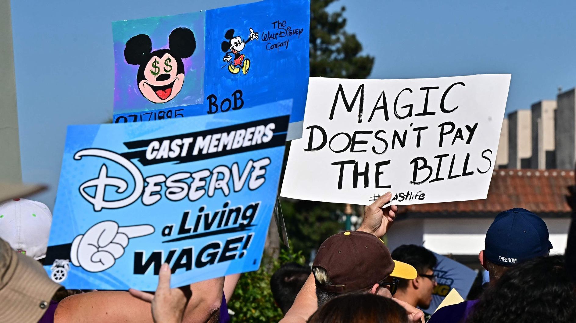 Disneyland workers threaten strike action over wages, treatment ...