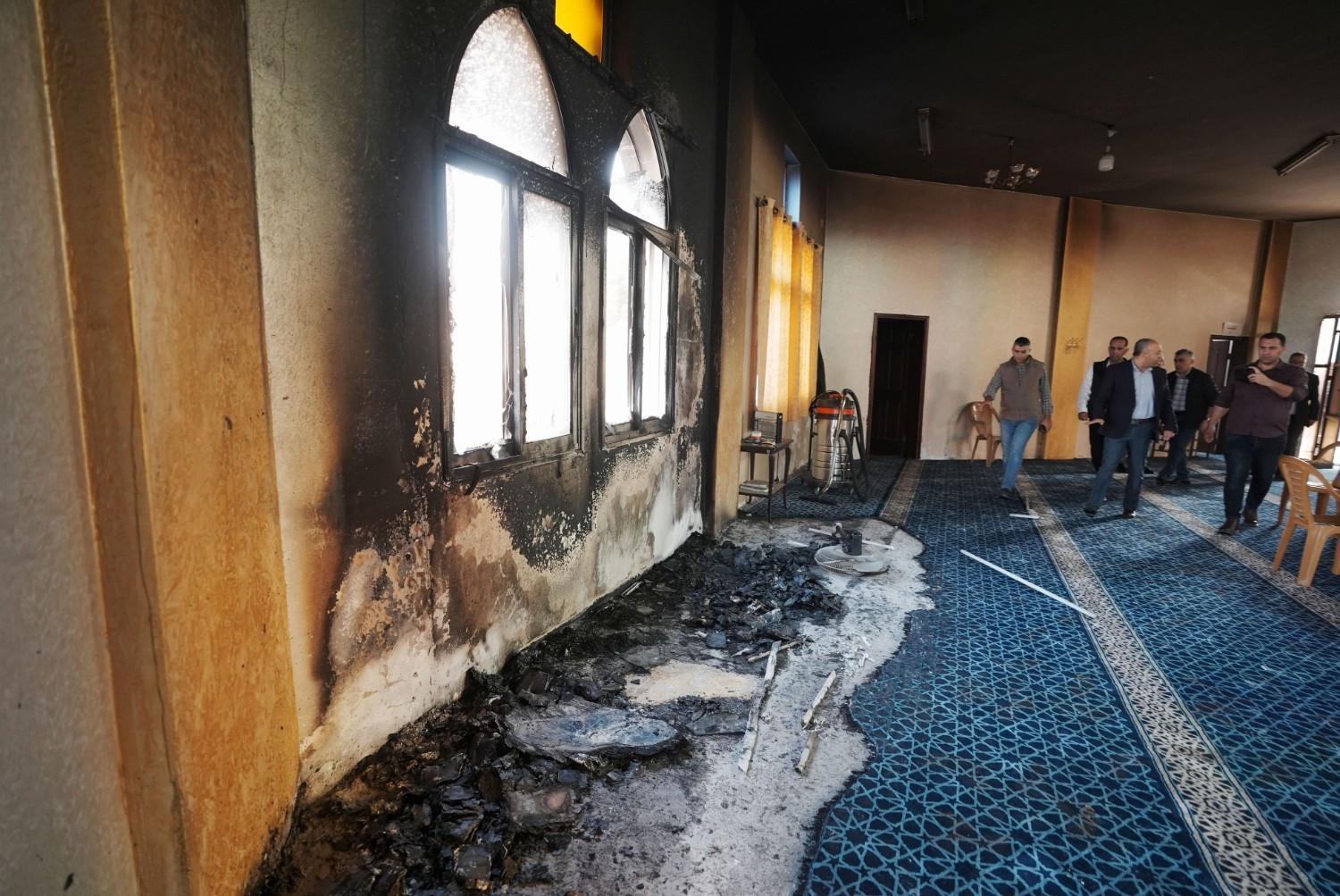 Israeli settlers torch West Bank mosque, scrawl hateful messages