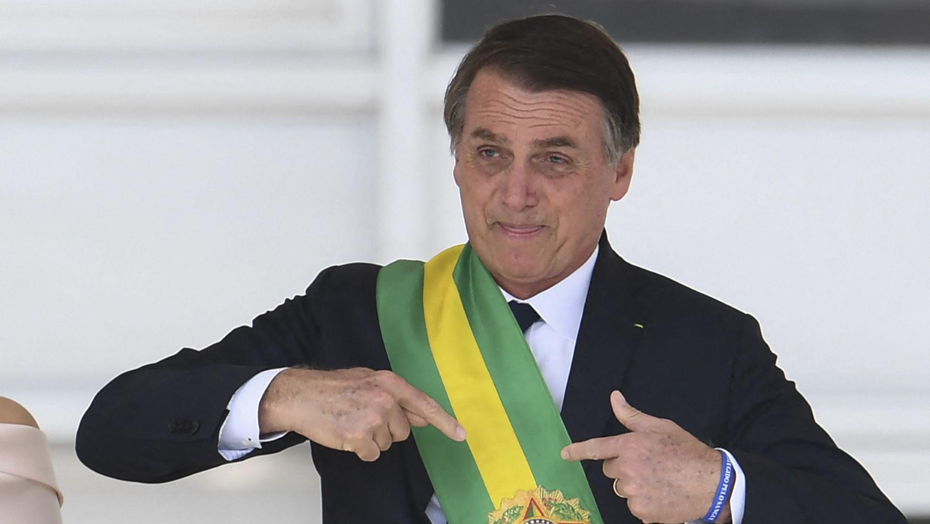 Brazils Bolsonaro begins 27-year jail term for coup bid