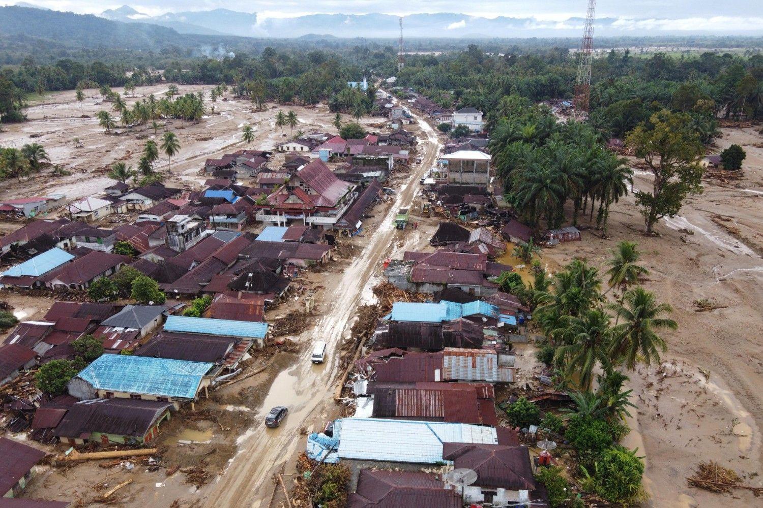 Race to get aid to Asia flood survivors as toll nears 1,200