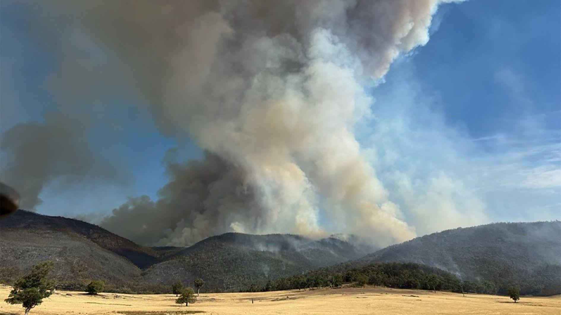 Scores of homes razed, one dead in Australian bushfires