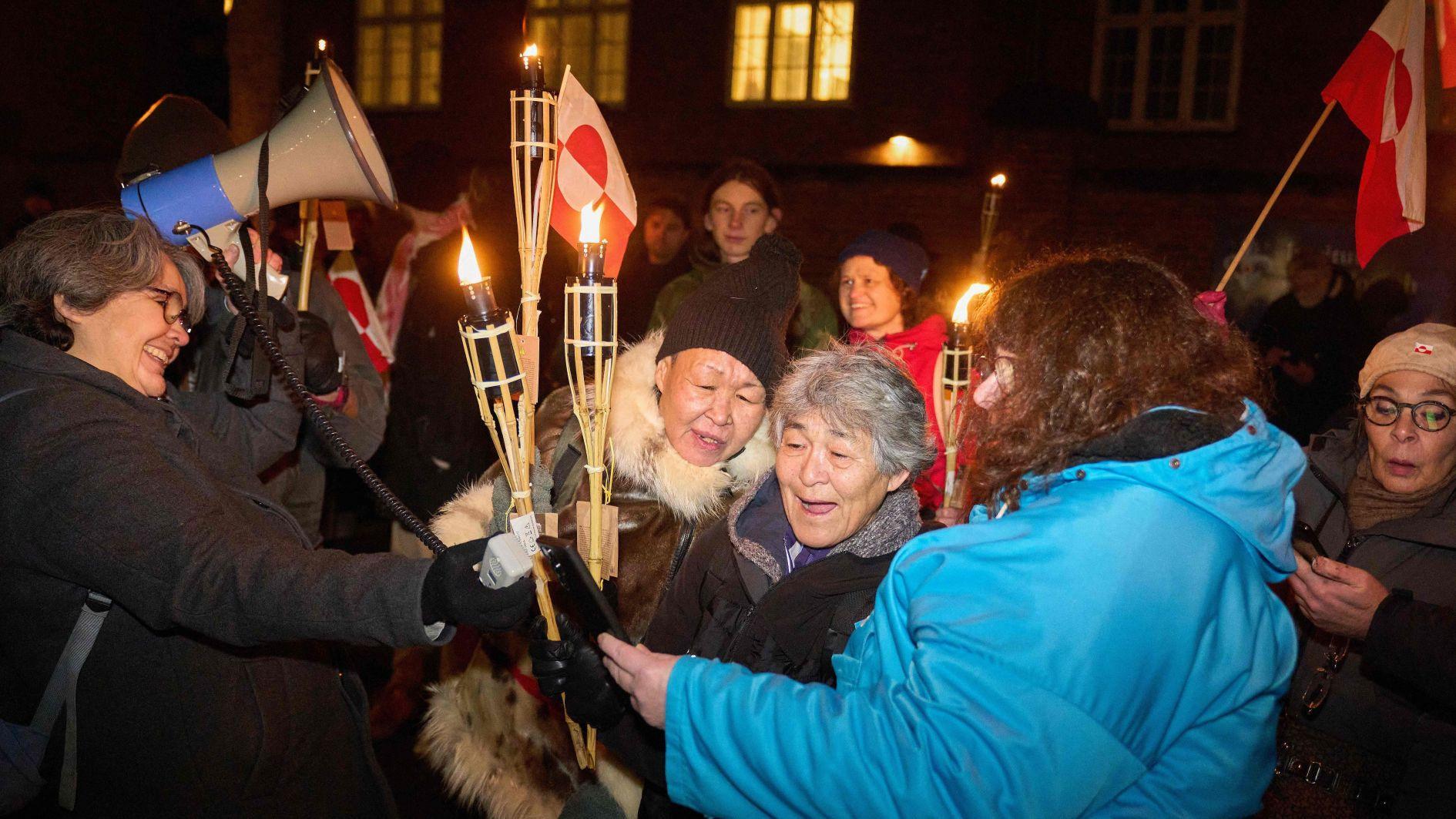 Greenlanders torn between anxiety and relief after talks