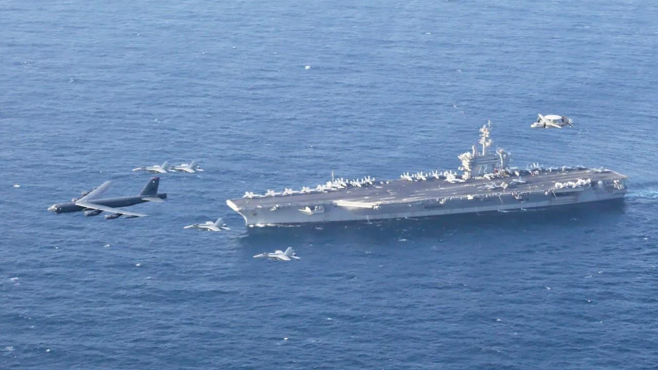 US deploys aircraft carrier as Iran warns against attack