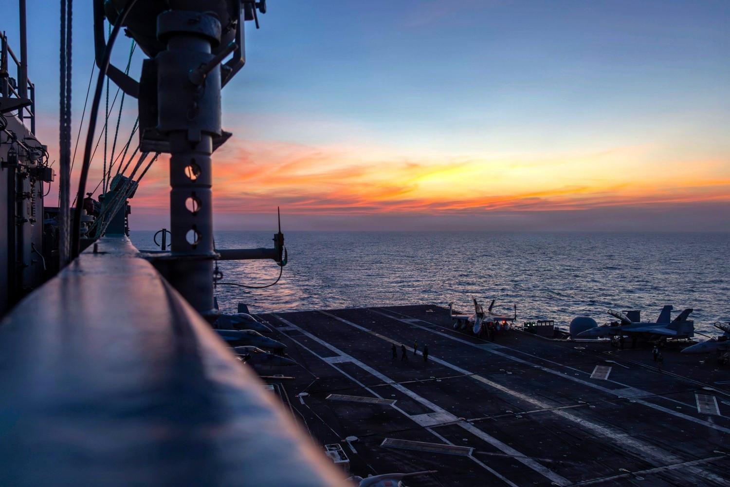 US deploys aircraft carrier as Iran warns against attack