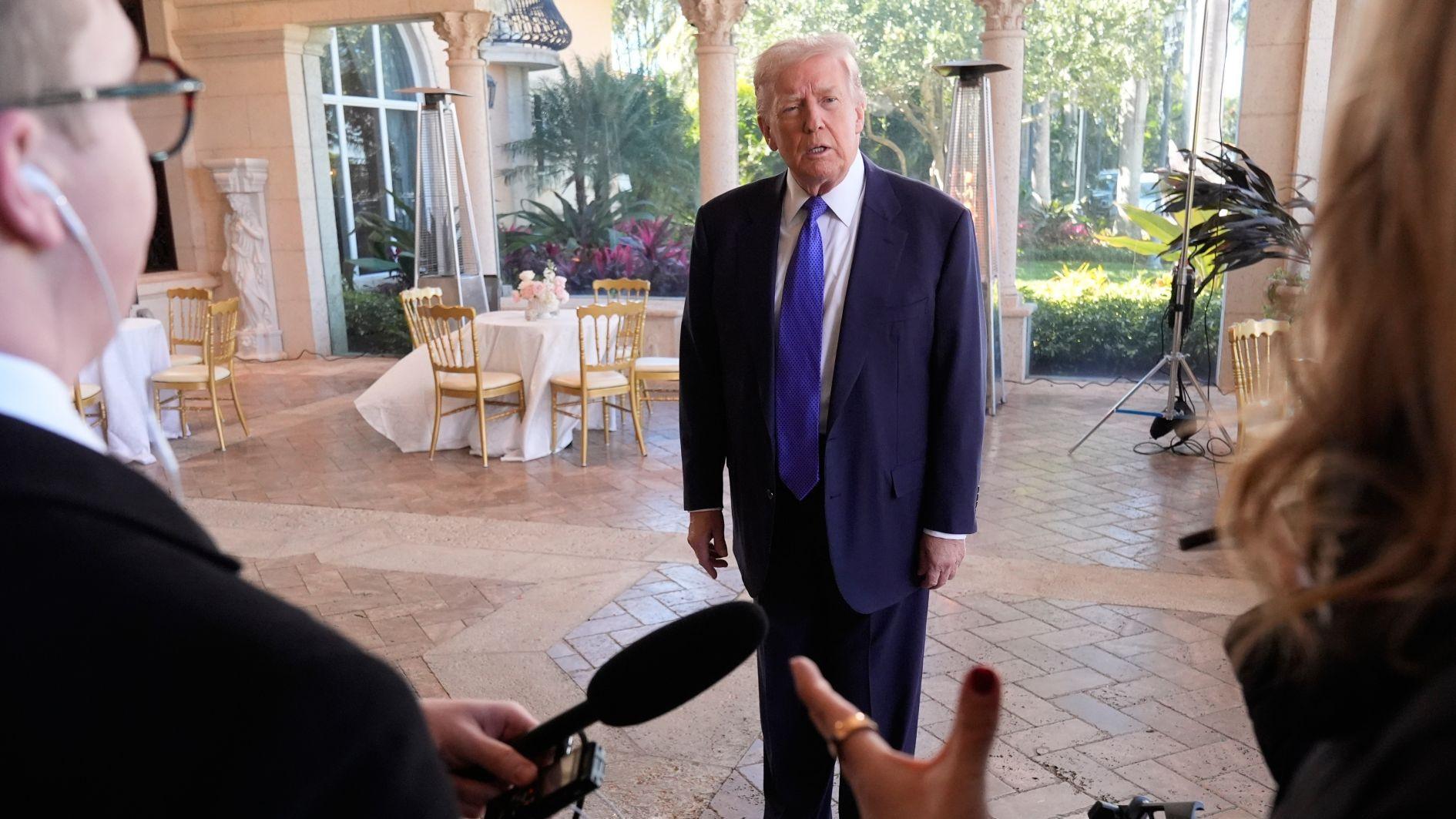 Trump hopeful of Iran deal after Tehran warns of regional war