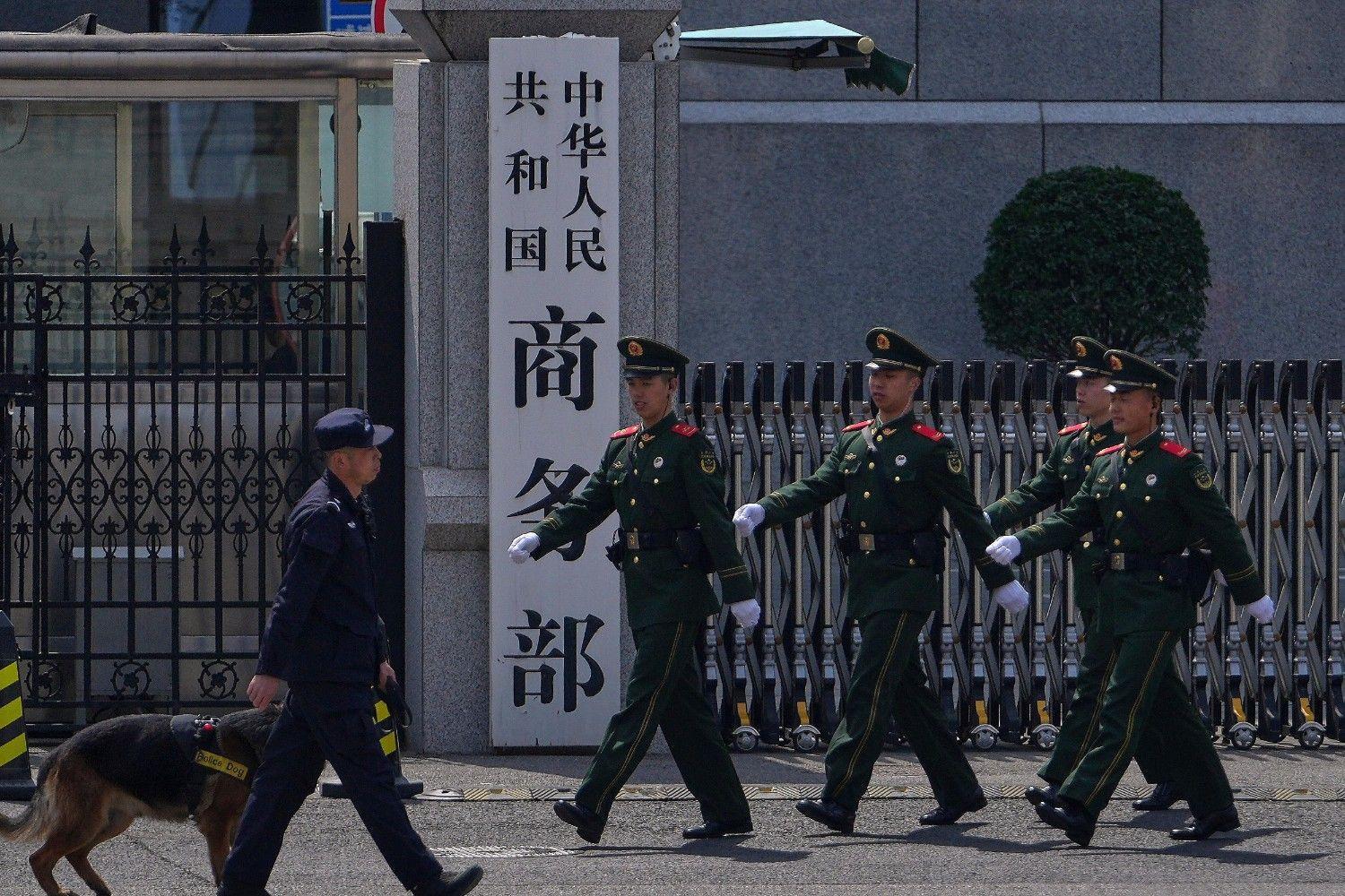 China acts against Japanese companies over military ties
