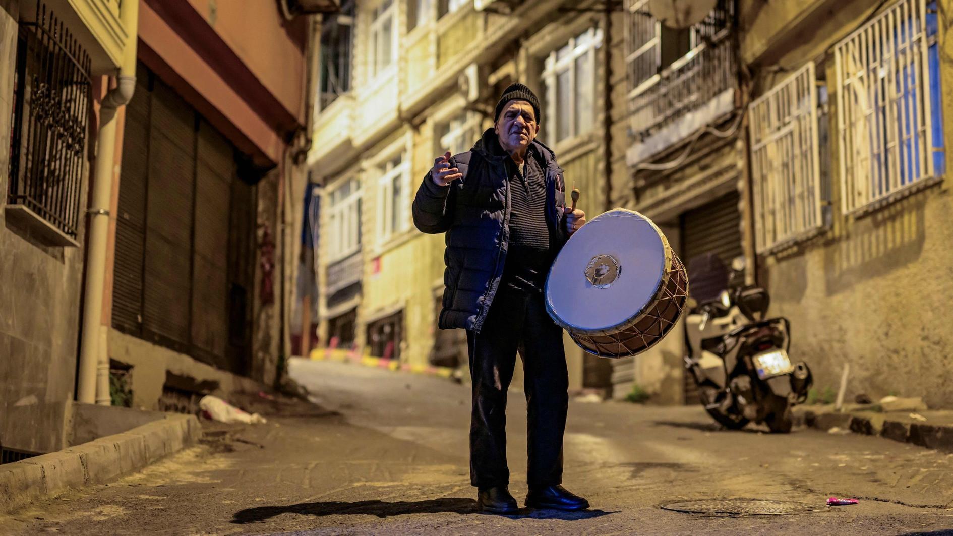 Before dawn, ancient drum rite wakes Istanbul faithful to fast