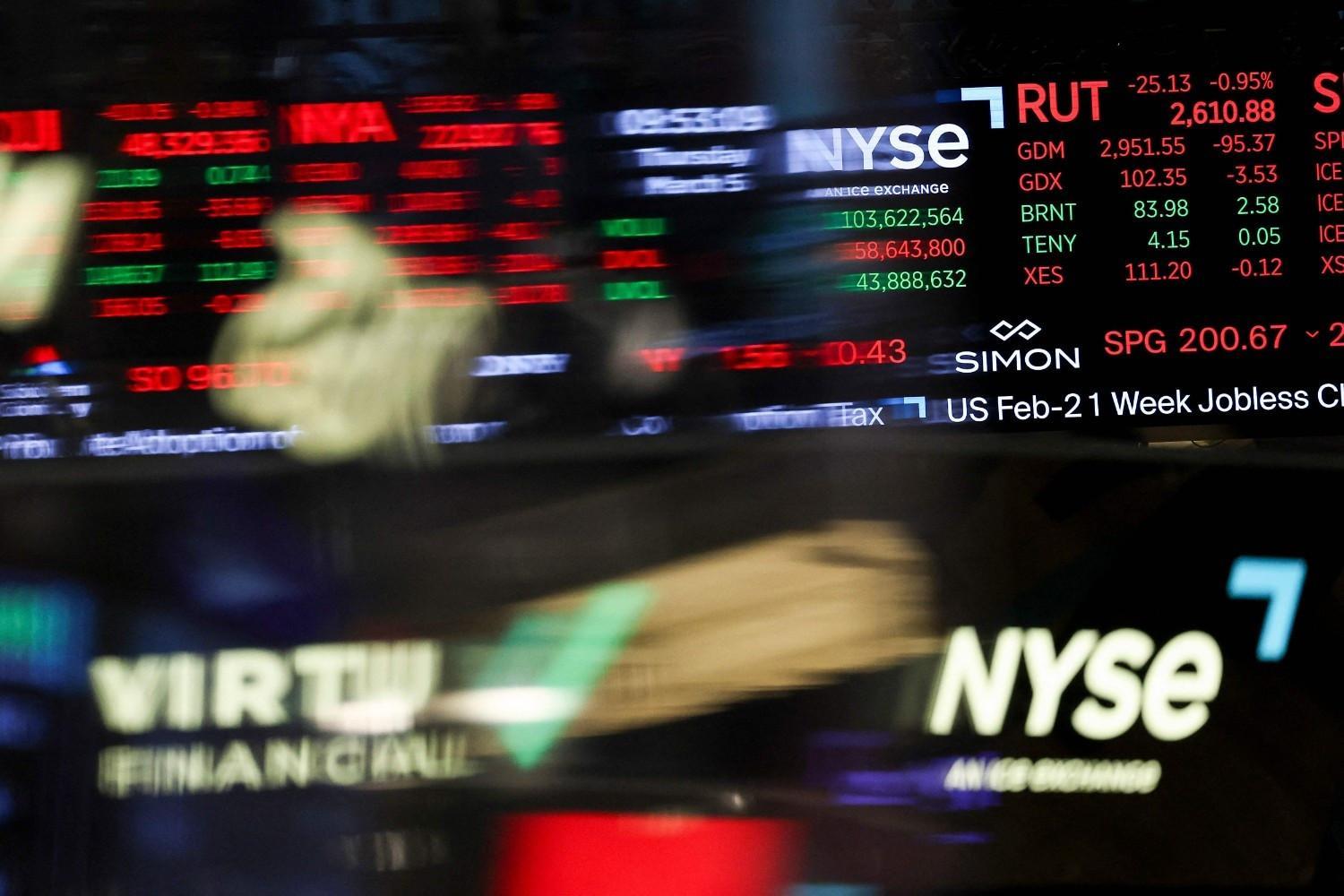 Equities mostly drop as Mideast crisis rages, though oil dips