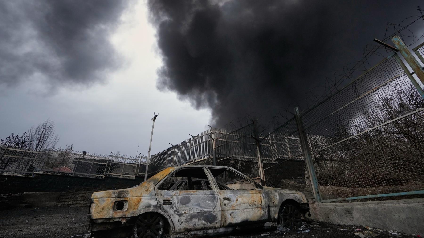 Tehran plunged into darkness by smoke from burning oil