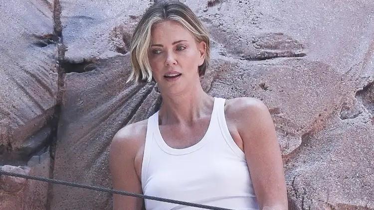 Charlize Theron scales Times Square billboard