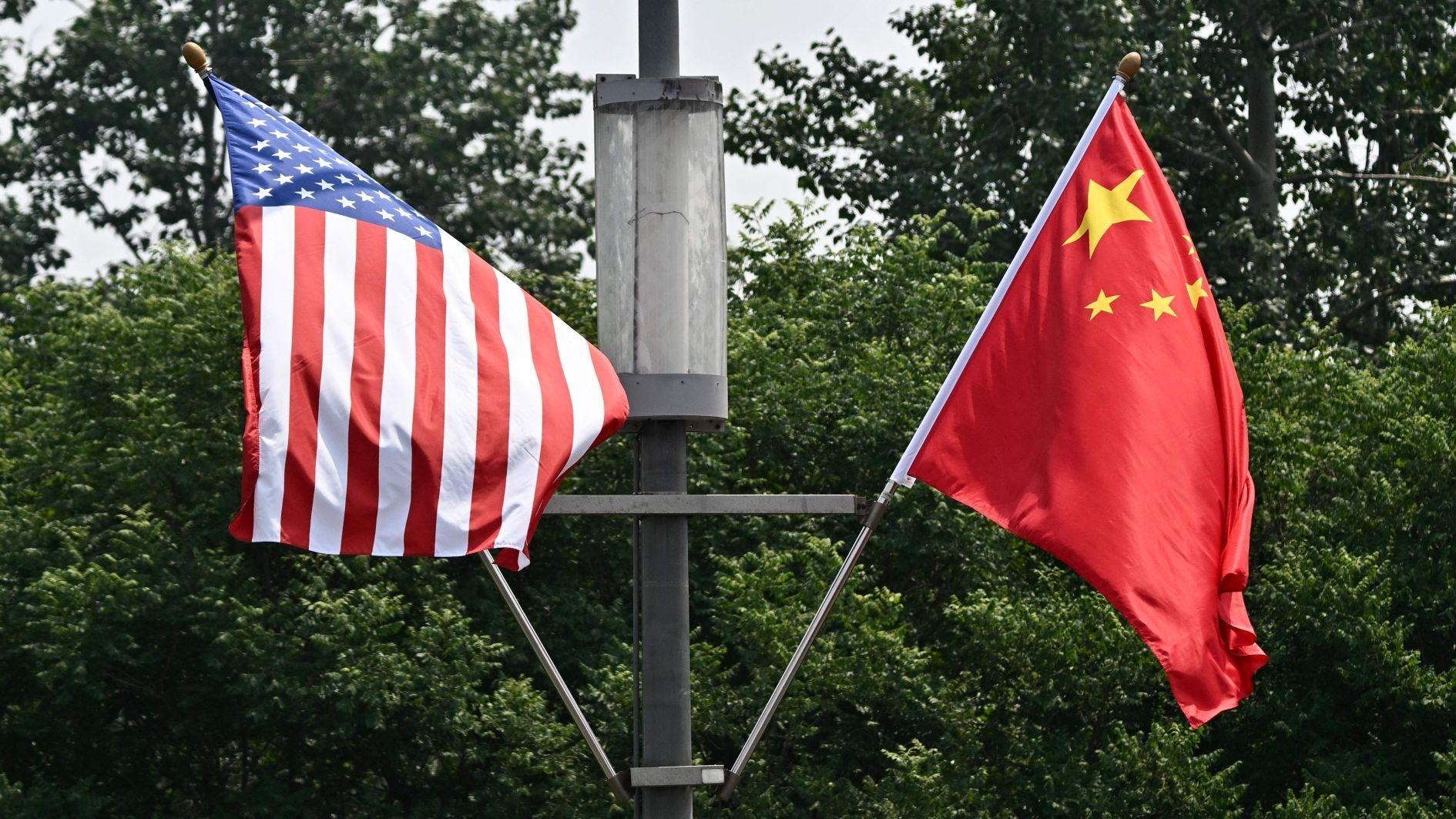 Trump vows to push Xi to 'open up' China at superpower summit
