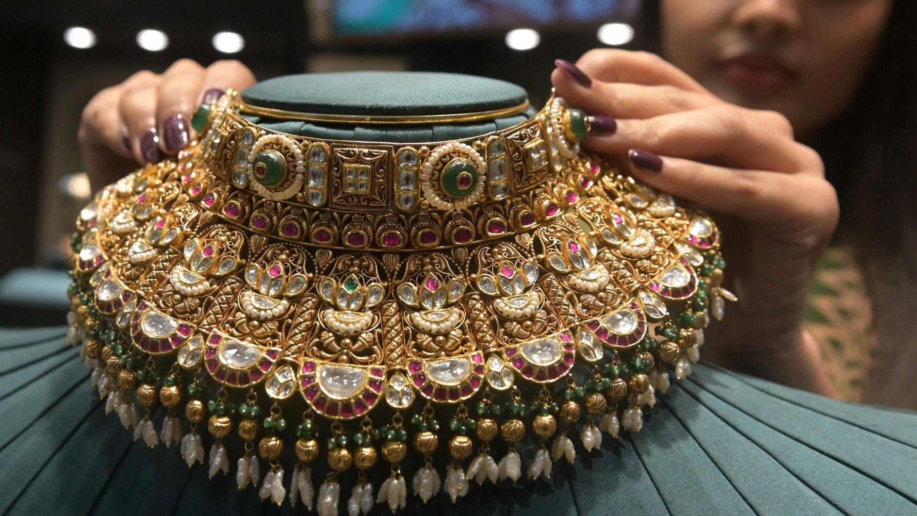 India hikes gold, silver duties to protect sliding rupee