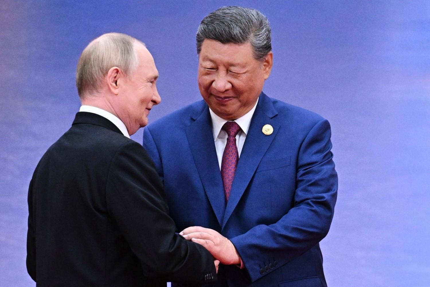 Xi hosts Putin in Beijing days after Trump