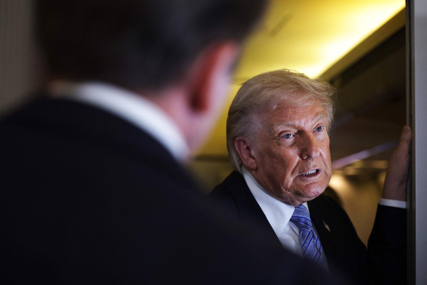 Trump says held off on new Iran attack, upbeat for agreement