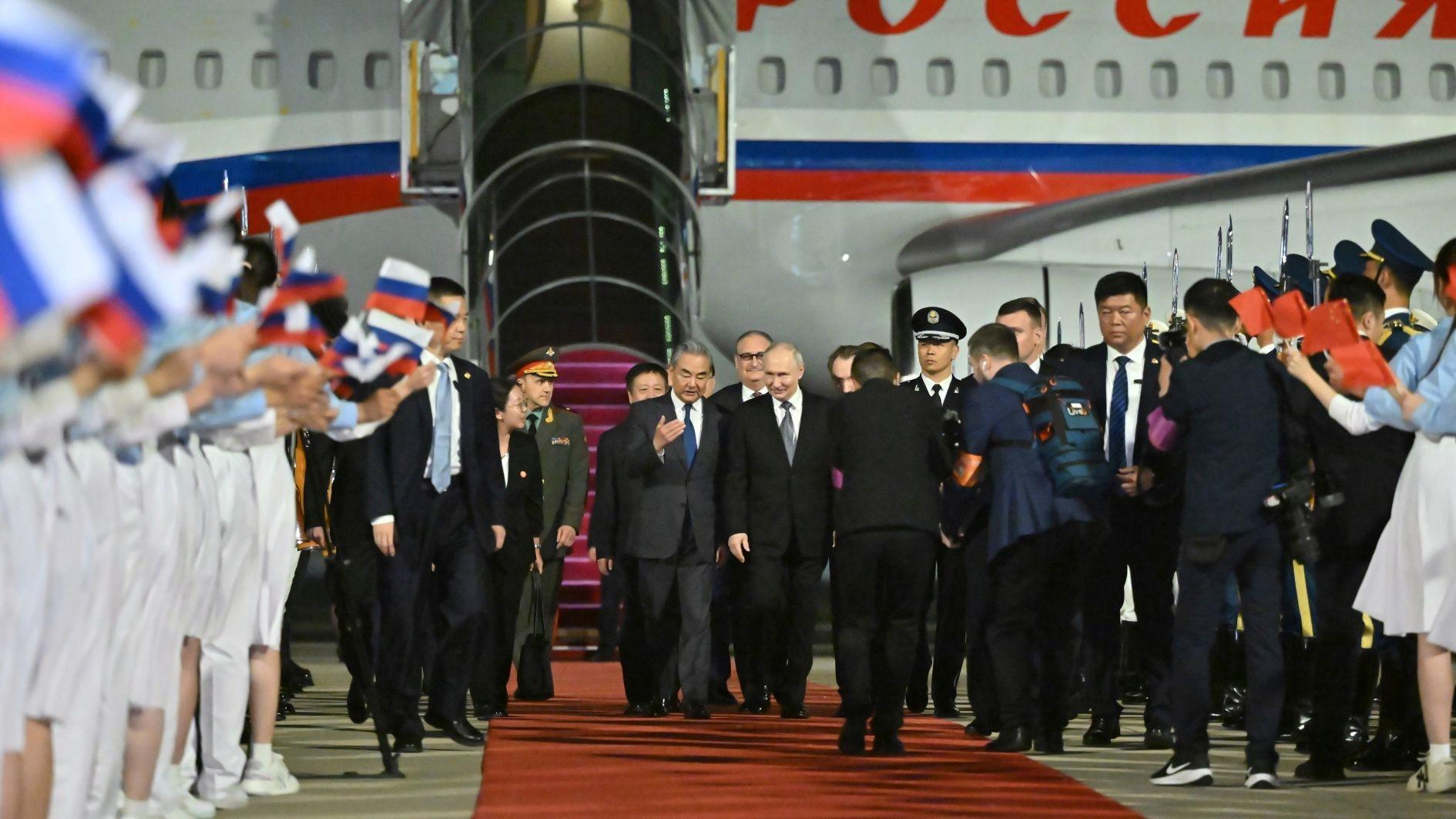 Putin lands in Beijing for talks with Xi