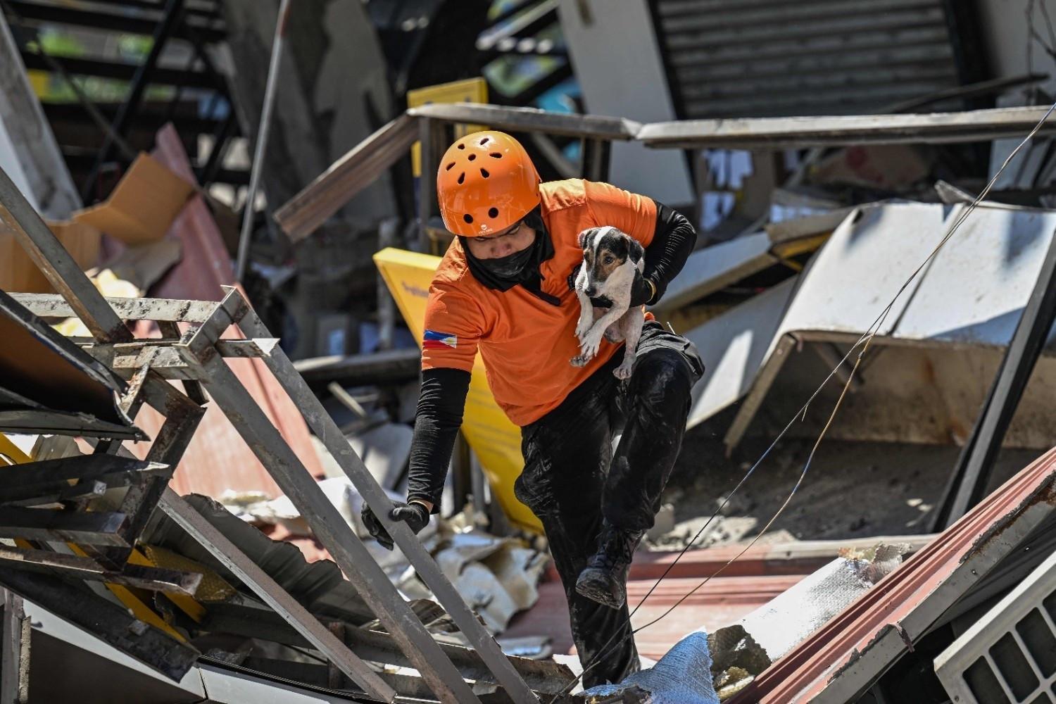 Outdoor hospitals, shaken communities as Philippine quake toll rises