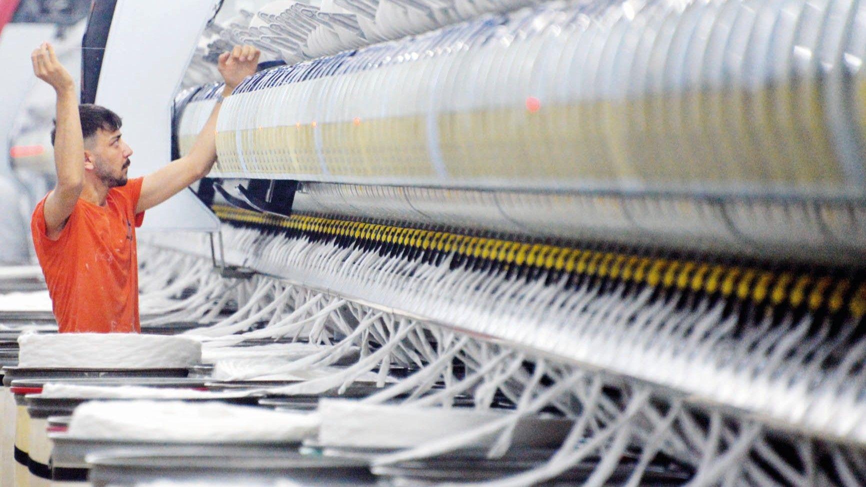 Business confidence improves, capacity usage rises