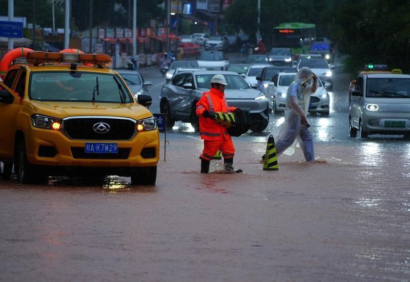 Rescuers search for survivors of China storms as super typhoon nears