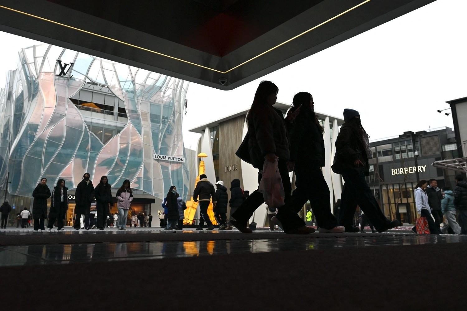 China's economy likely cooled in second quarter: analysts