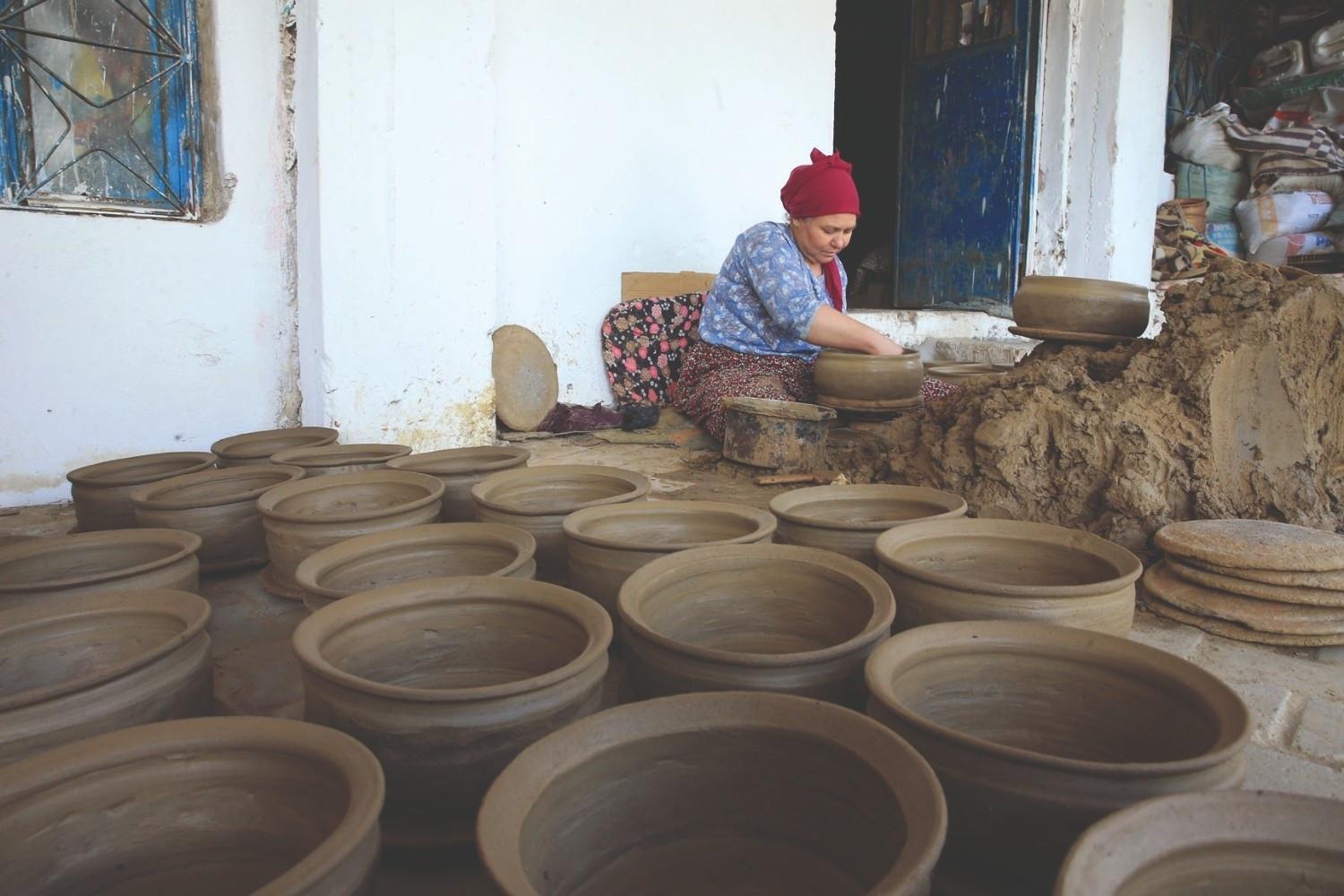 Local women turn volcanic rock into durable cookware