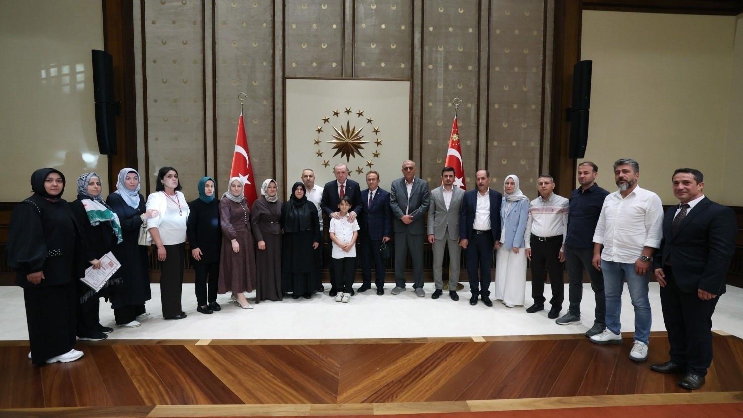 Erdoğan meets families of school attack victims