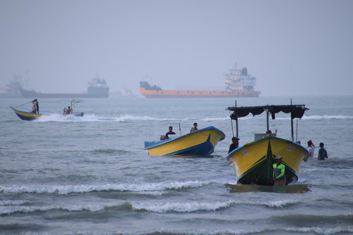 Iran says Hormuz route agreed with Oman, reopening uncertain