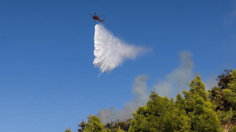 Greece battles new fire driven by winds