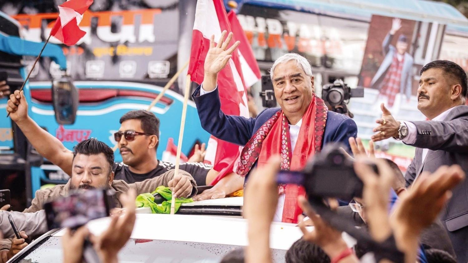 Former Nepalese PM Deuba returns home