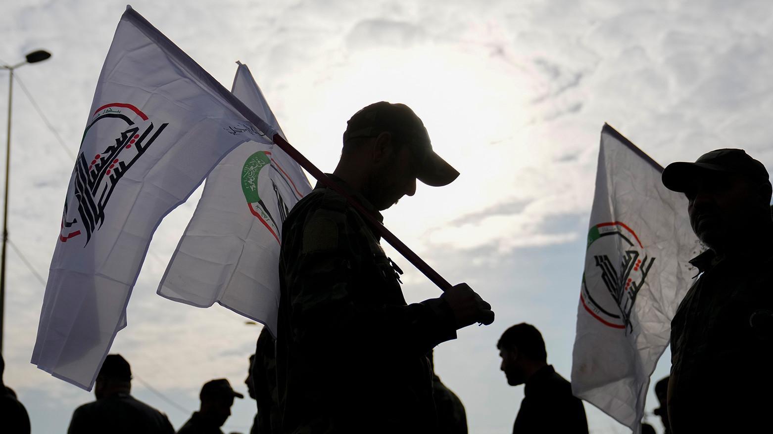 Iraq says arms of mobilization forces will not be collected