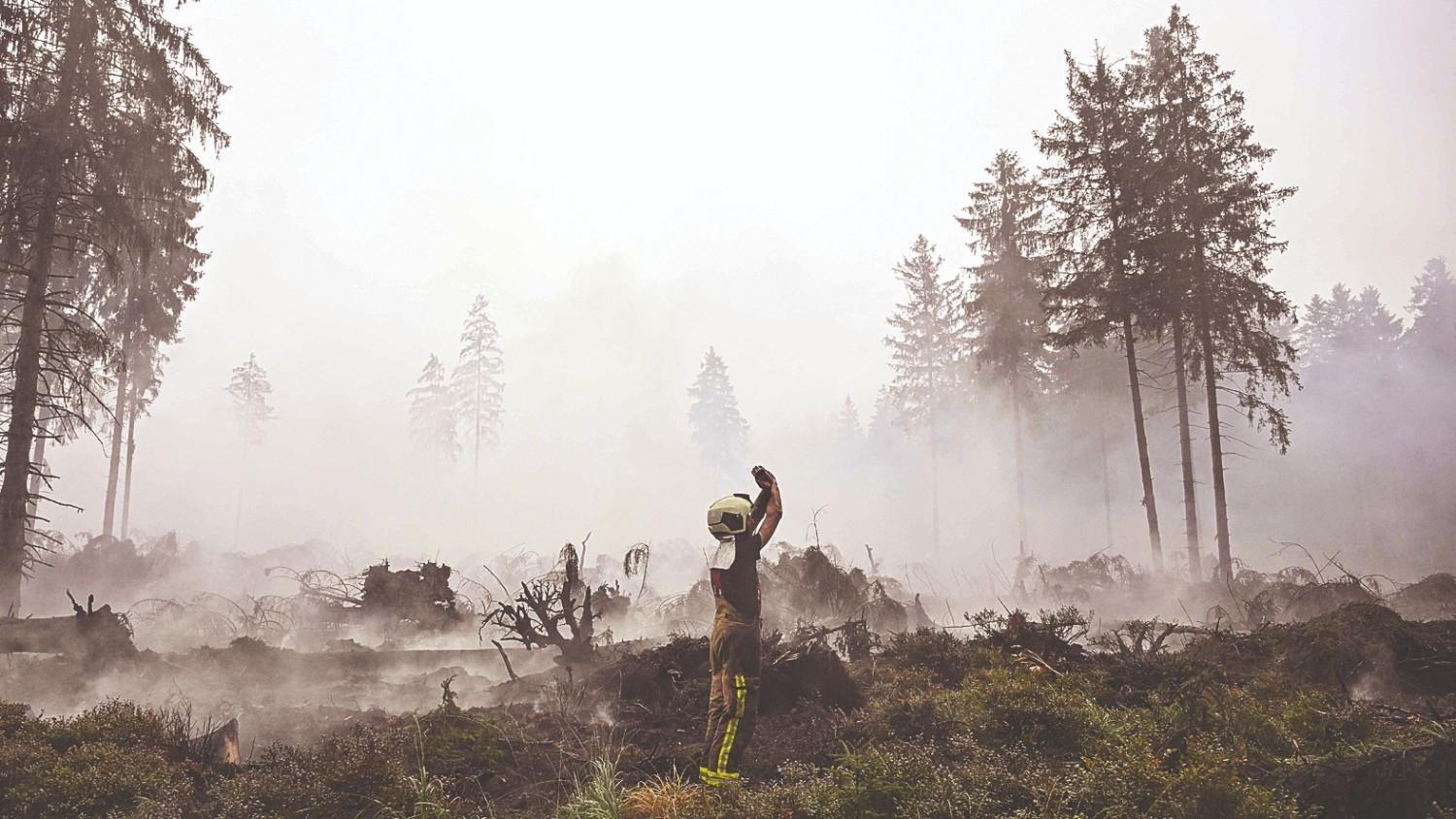 Belgian wildfire ‘encircled’ but situation still ‘complicated’