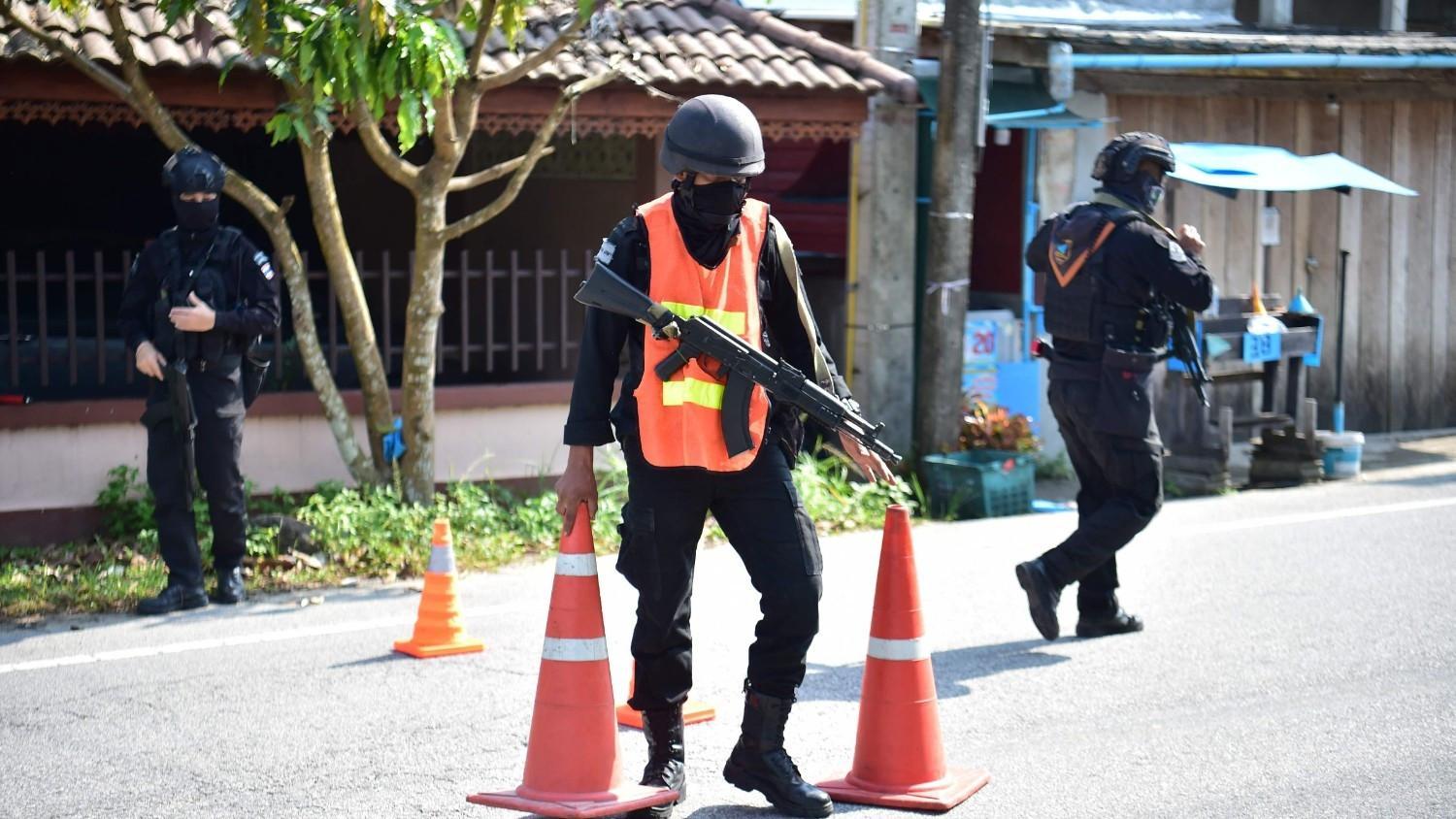 Dozens of attacks in Thailand's restive south leave 2 injured