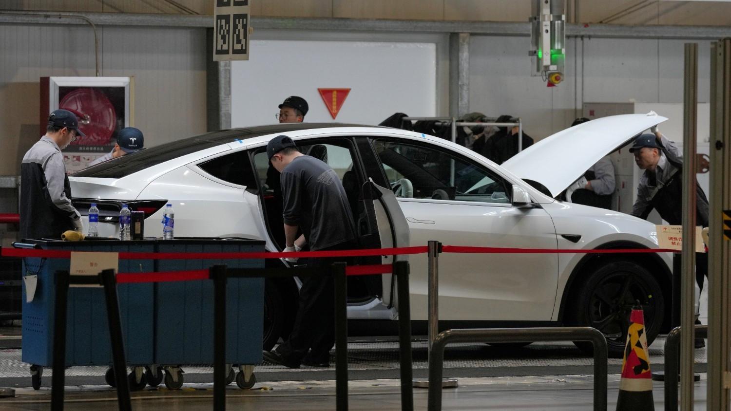 Millions of Teslas recalled in China over door handle safety