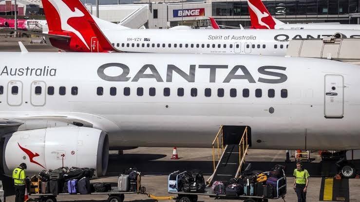 Qantas says profits slump as fuel costs surge