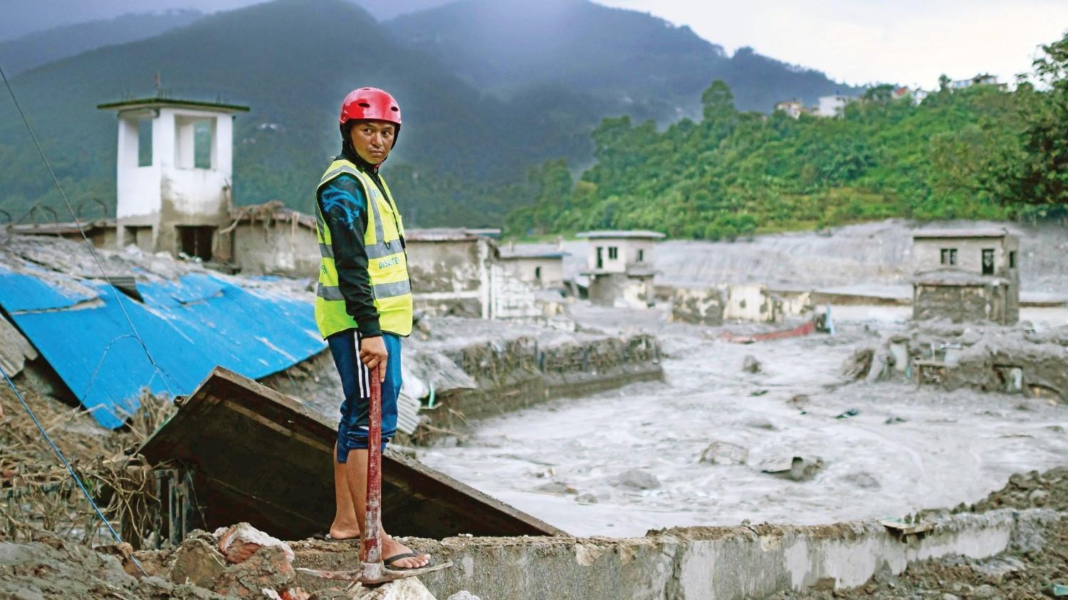 Rescuers dig into tunnel as missing toll from Nepal flood tops 3,000