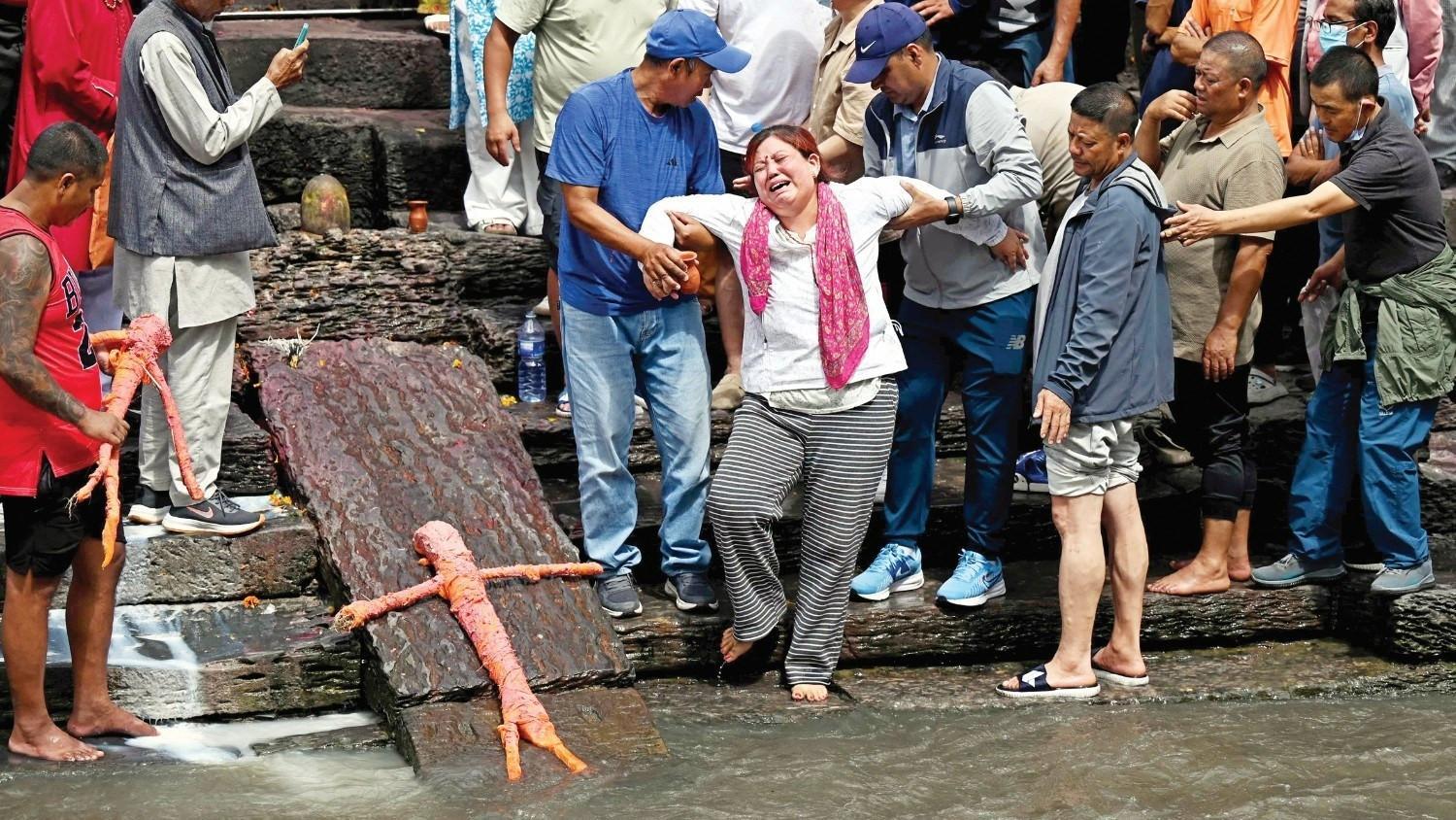 Funerals in Nepal for missing, a week after deadly floods
