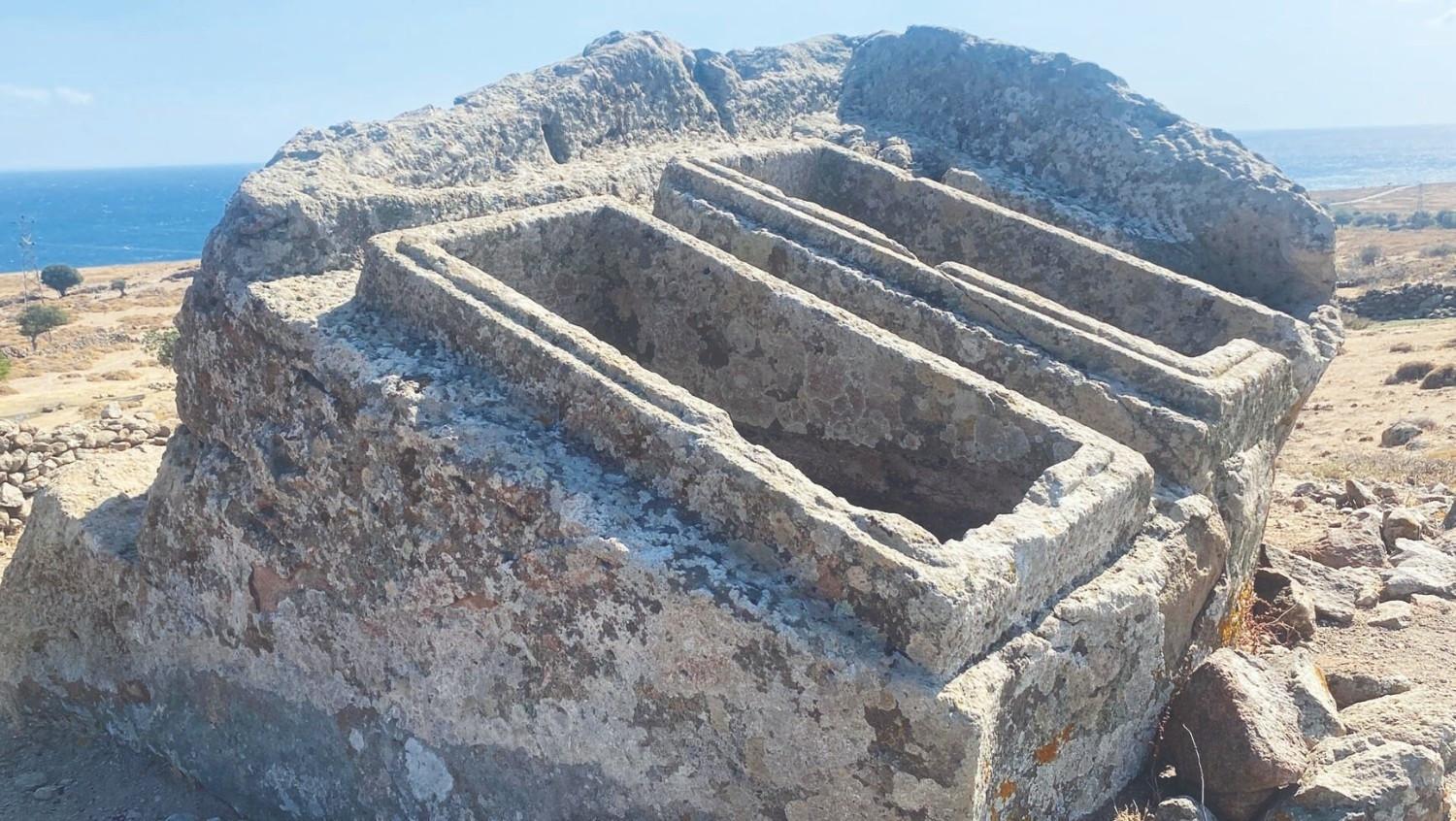 Twin sarcophagus carved into giant rock